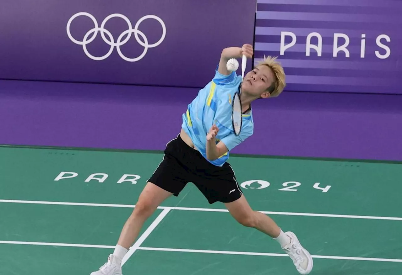 Jin Wei overcomes jitters to win first Olympics match