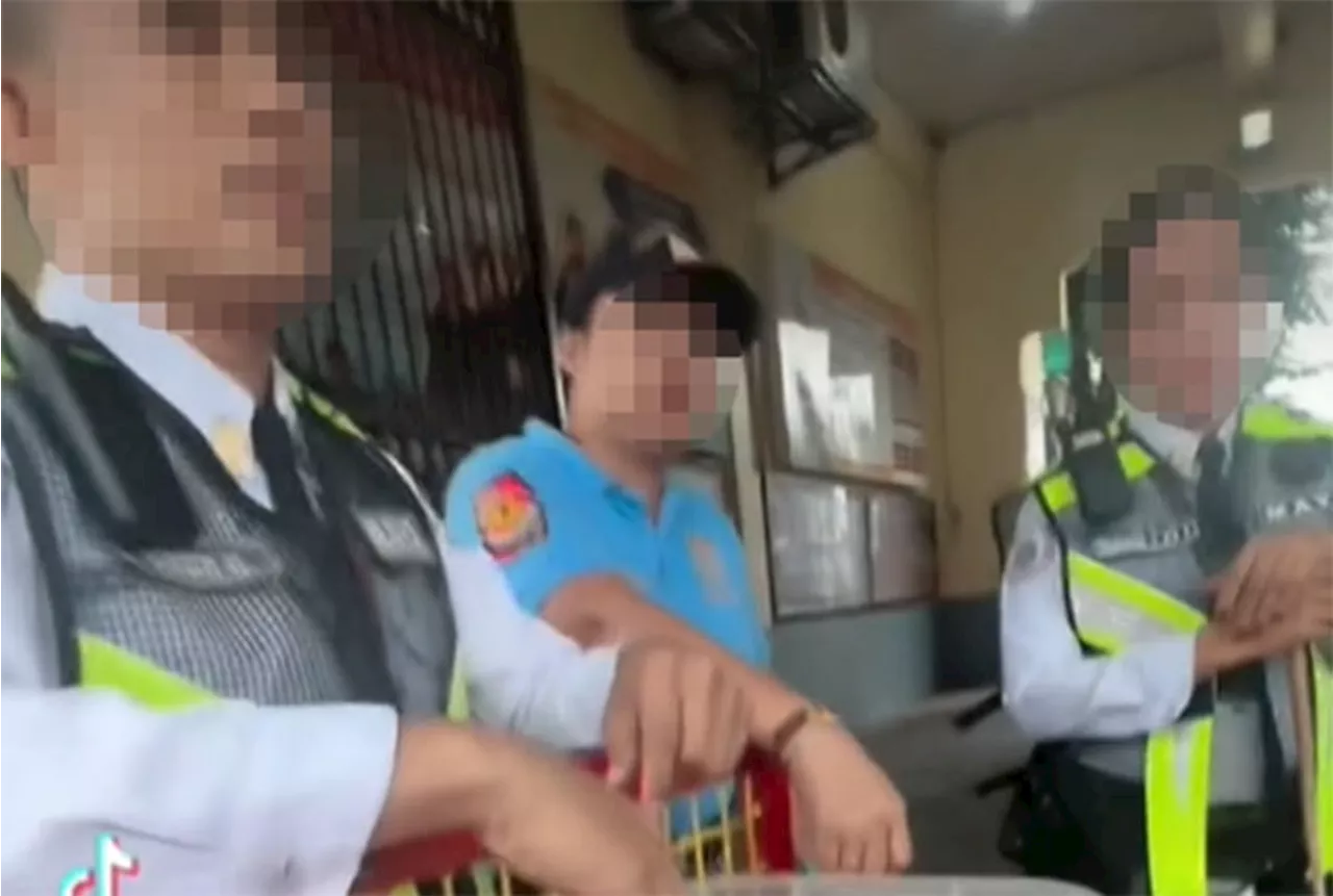 Female cop in viral Sto. Niño church video relieved from post