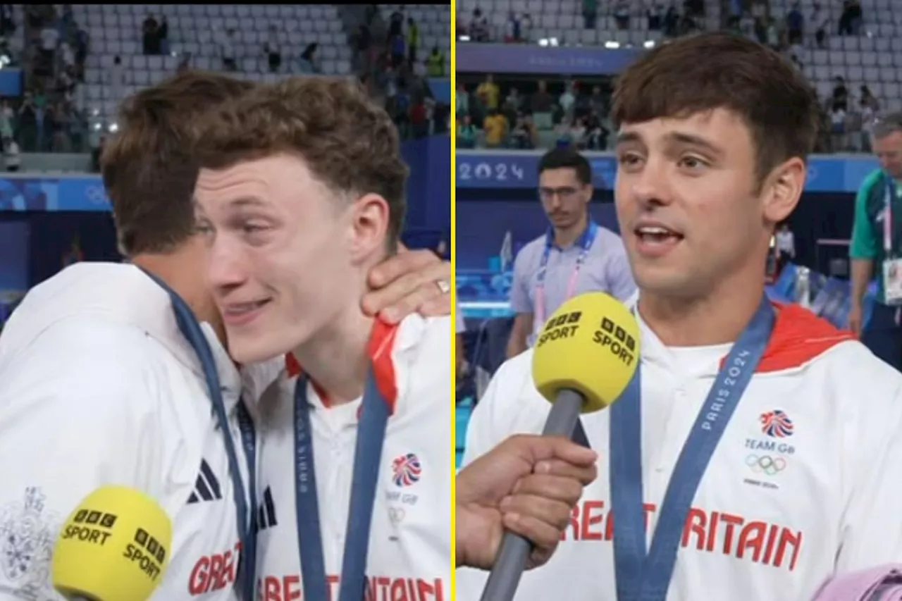 Tom Daley consoles Noah Williams who fights back tears in emotional interview as Olympic silver medal win...