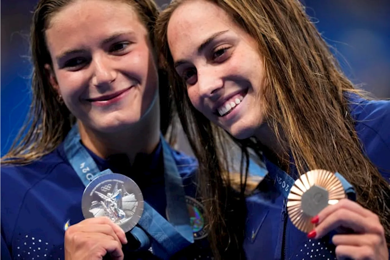 American swimmers grabbed plenty of hardware Monday at the Olympics, but no gold