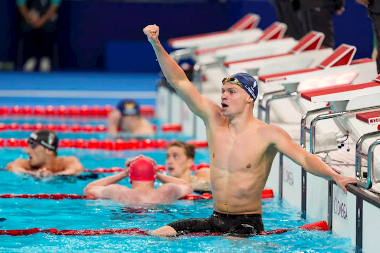 Longtime Phelps coach Bob Bowman was in tears watching new star pupil Leon Marchand win gold