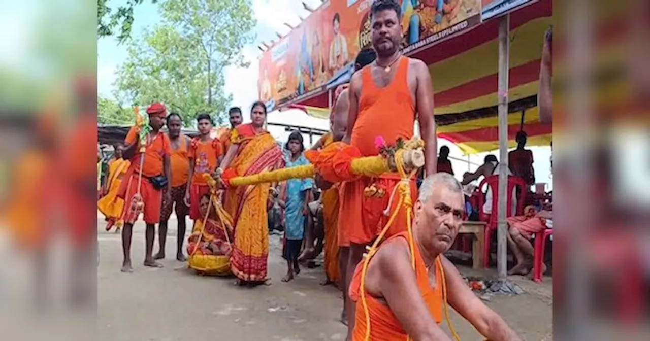 Kanwar Yatra: बहंगी में तरफ मां दूसरी ओर पिता चंदन का साथ दे रही पत्नी, कांवड़िया पथ पर दिखा अद्भुत नजारा