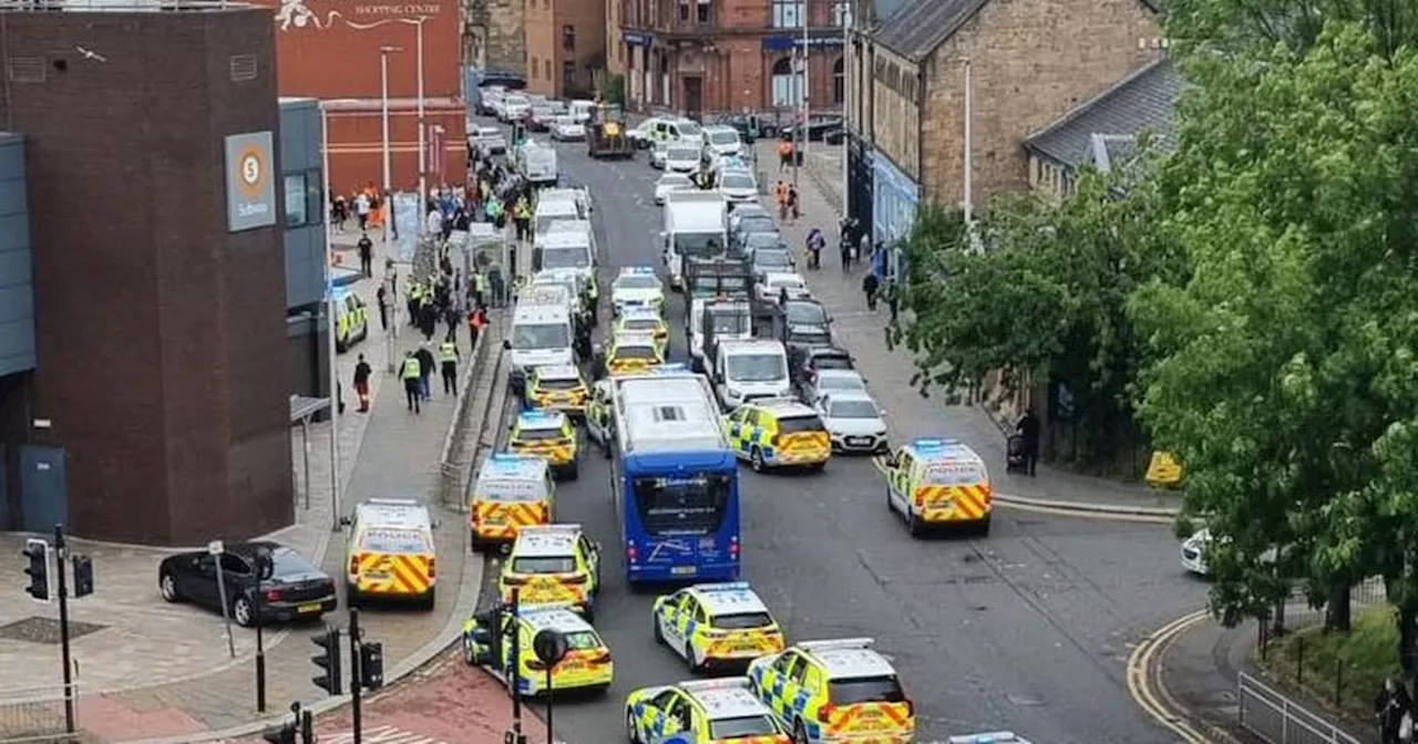 Police swarm Govan street amid reports of major ongoing incident