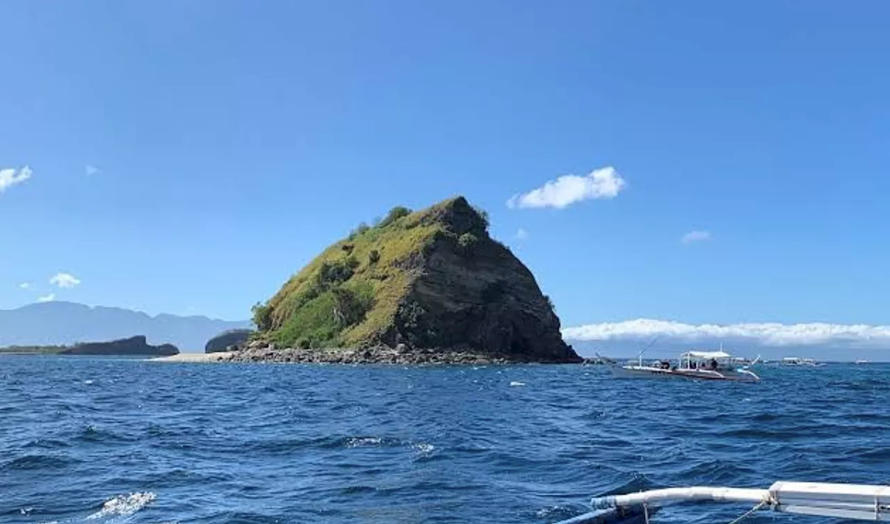 Philippine diving town swaps trash for rice to clean up its beaches