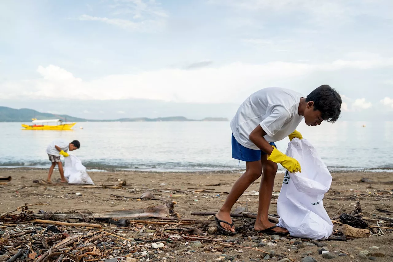 Philippine diving town swaps trash for rice to clean up its beaches