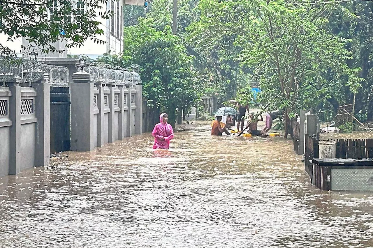 Thousands trapped by flooding