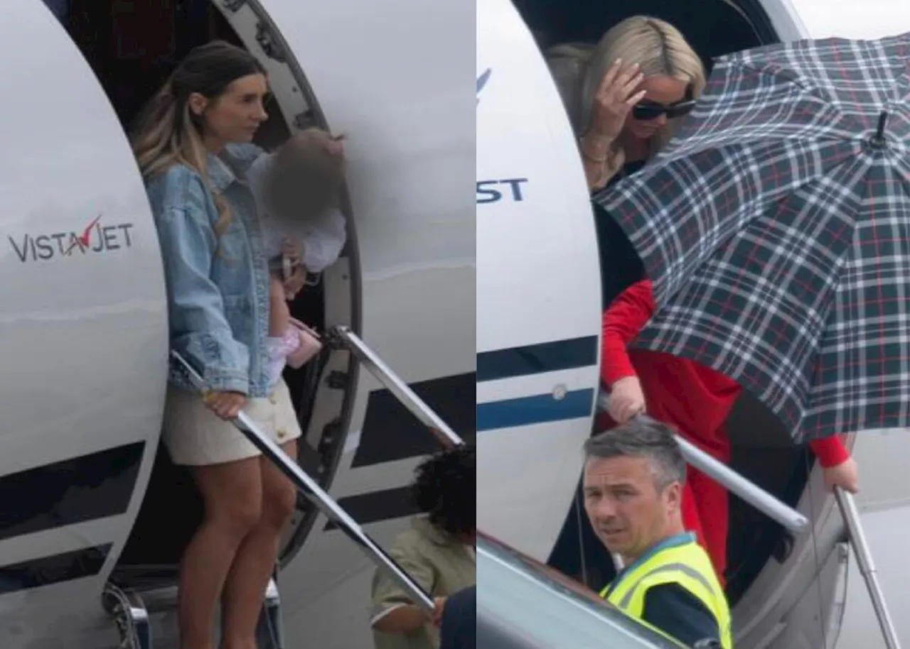 England WAGs arrive in Germany in spectacular style