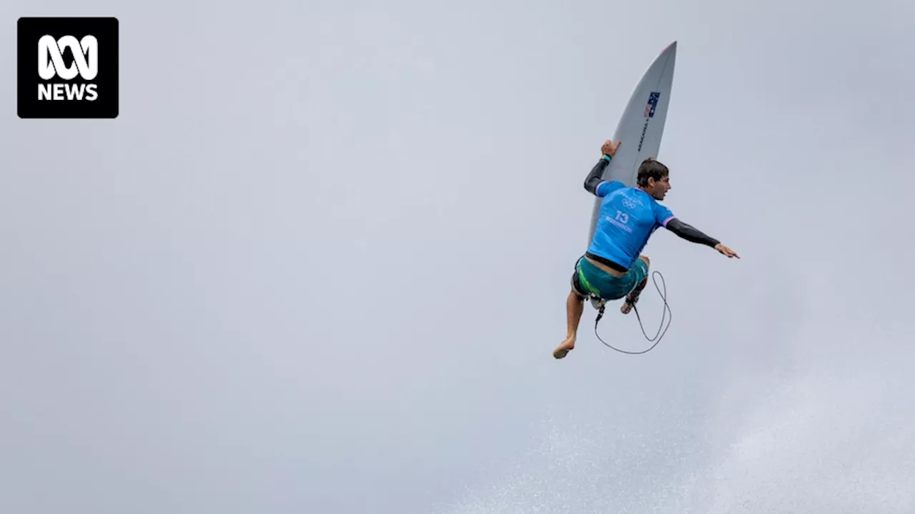 Australia's Jack Robinson sends world number one John John Florence packing in wild surf conditions at the Paris Olympics