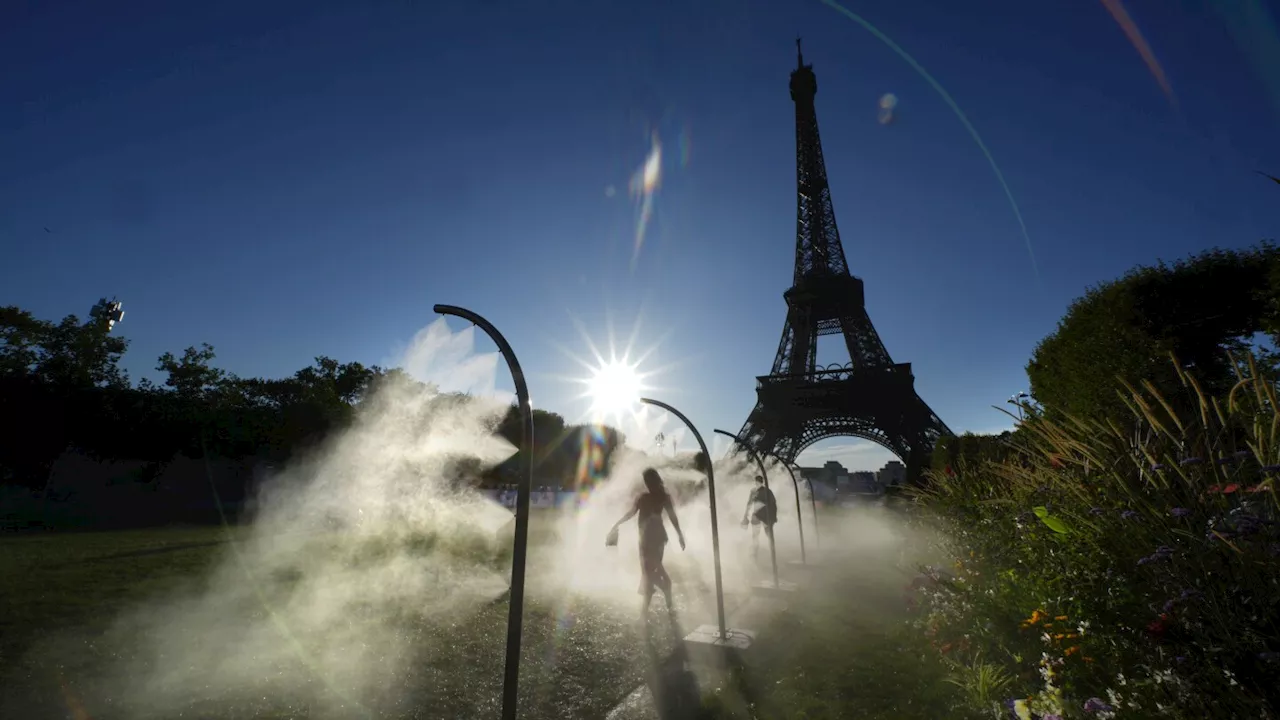 Paris Olympics brings out hoses and misters to cool down fans during heat wave