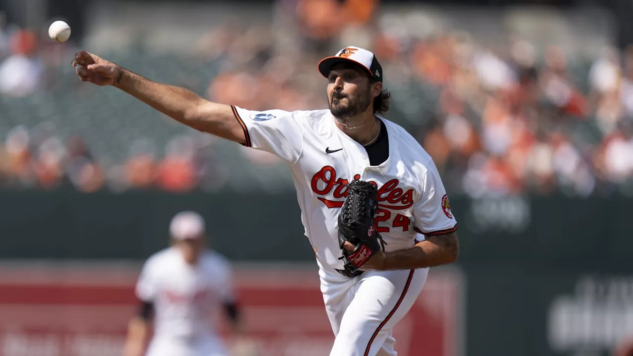 Zach Eflin yields 10 hits in Orioles debut but earns the victory in 11-5 rout of Blue Jays