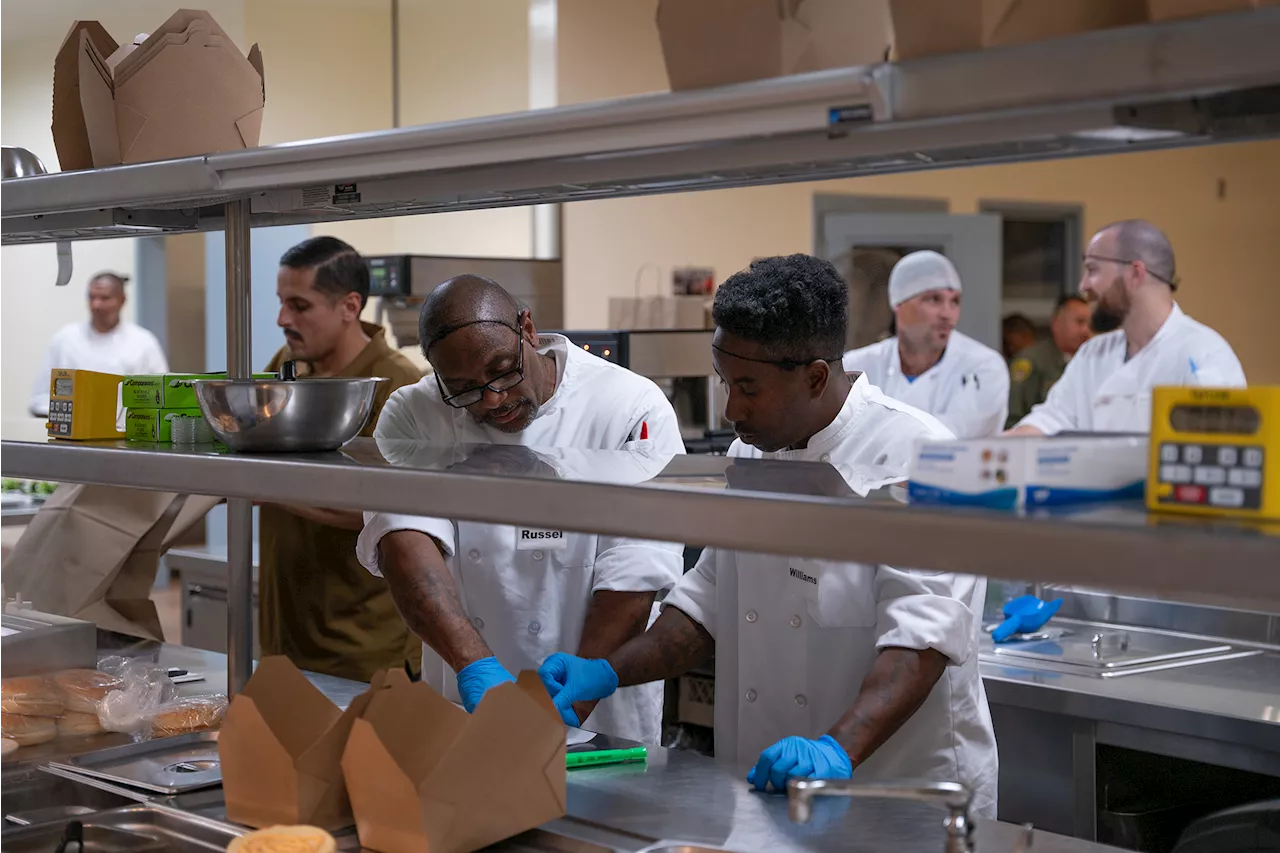 In this California prison, inmates cook for their guards and others, ‘rely on each other’