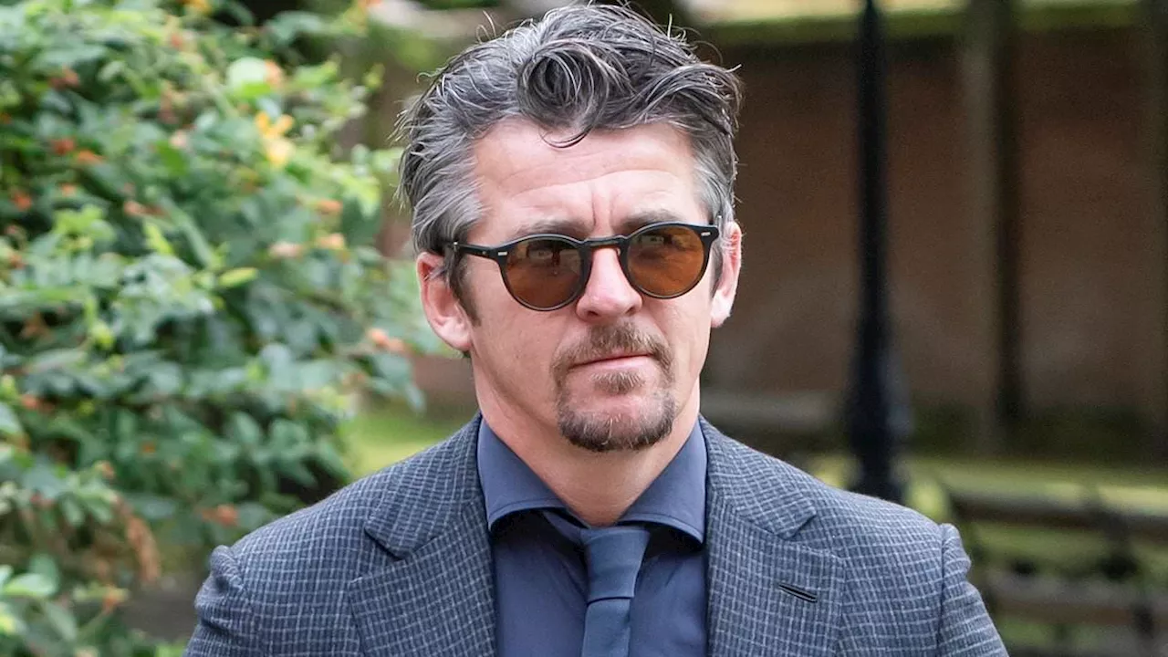 Joey Barton arrives at court accused of malicious communications