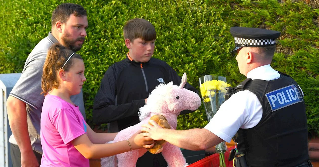 Children lay flowers and teddy bears at Southport stabbing scene as tributes mount