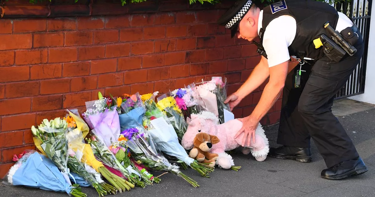 Horrified residents hug in street after two children die in Southport stabbing