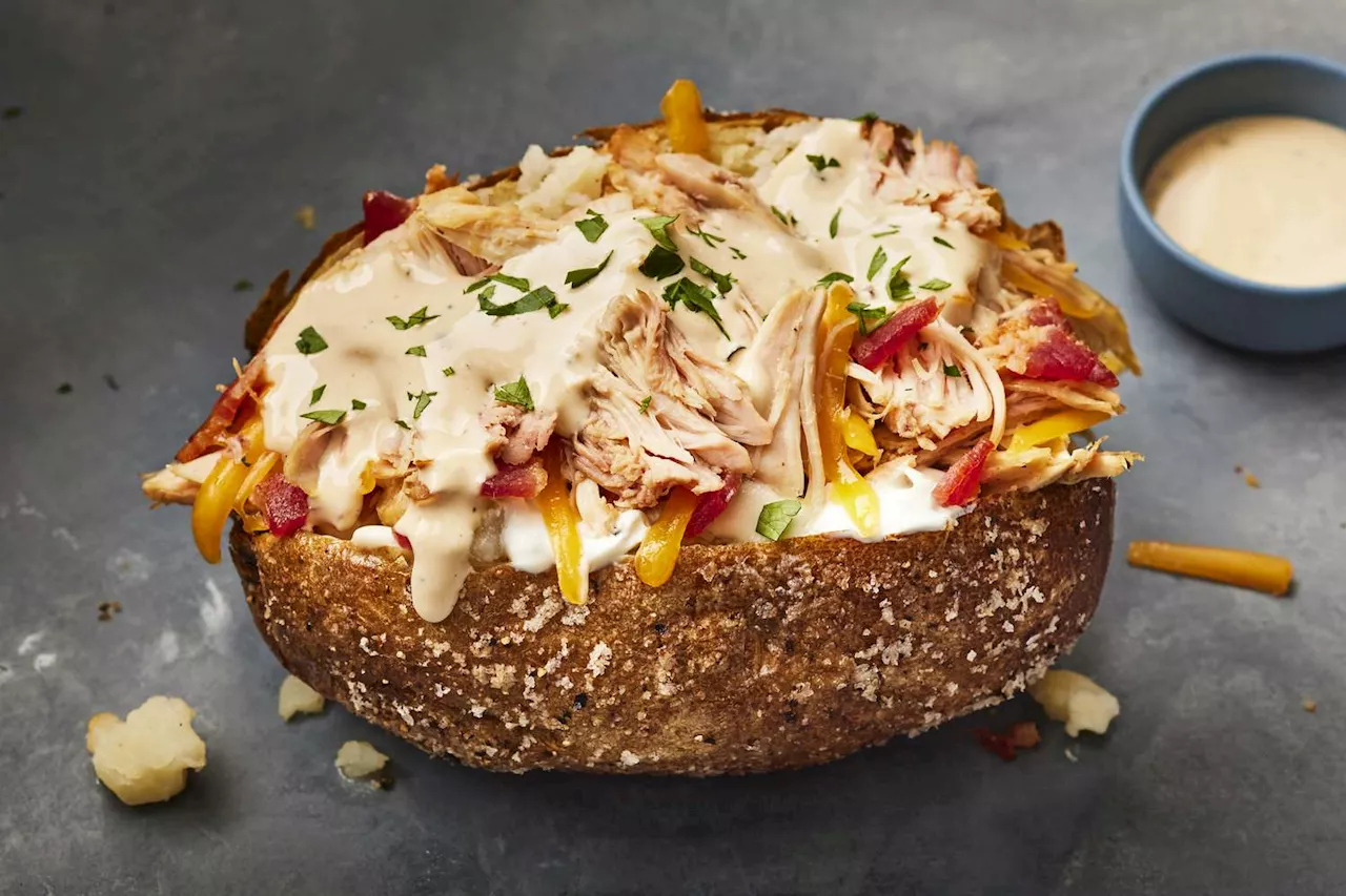 Loaded Baked Potatoes with Smoked Chicken and Alabama White Sauce