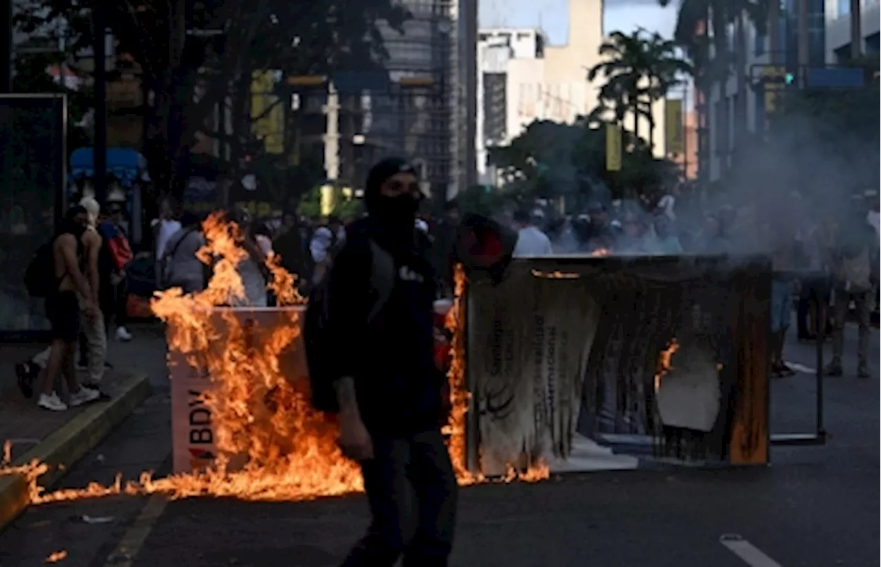 One dead in Venezuela as protesters teargassed in wake of disputed vote