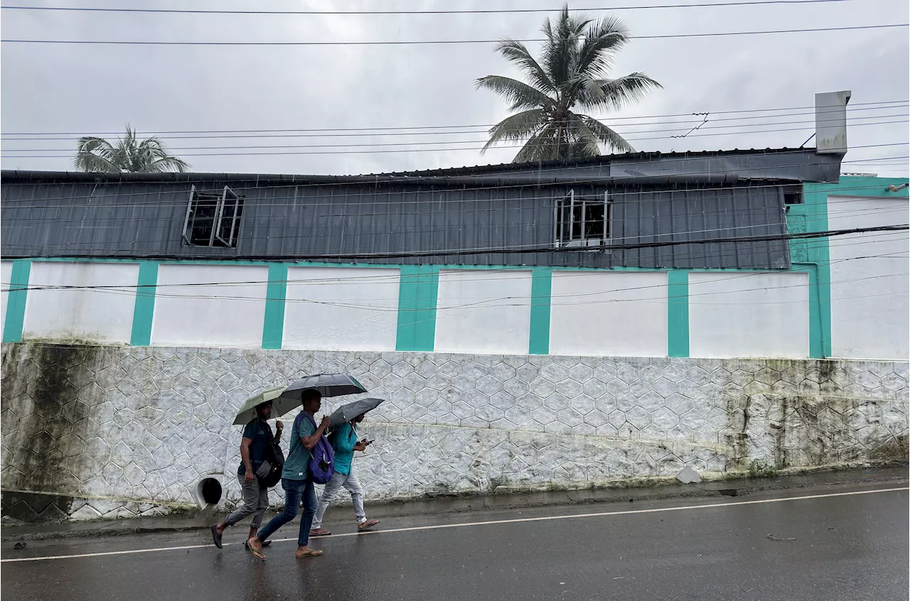 Landslides caused by heavy rains kill 24 and bury many others in southern India