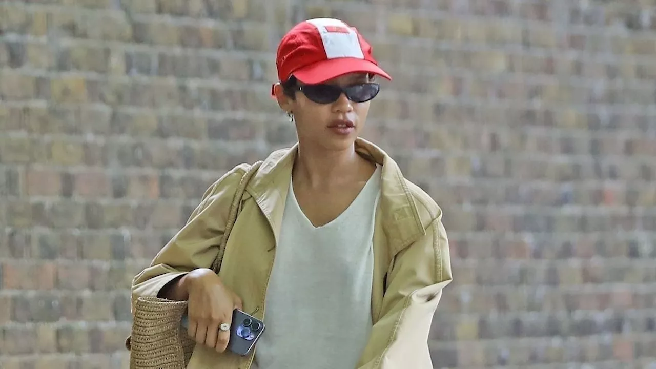 Taylor Russell Pairs a Classic Trench Coat With One of 2024's Reigning Sneaker Trends