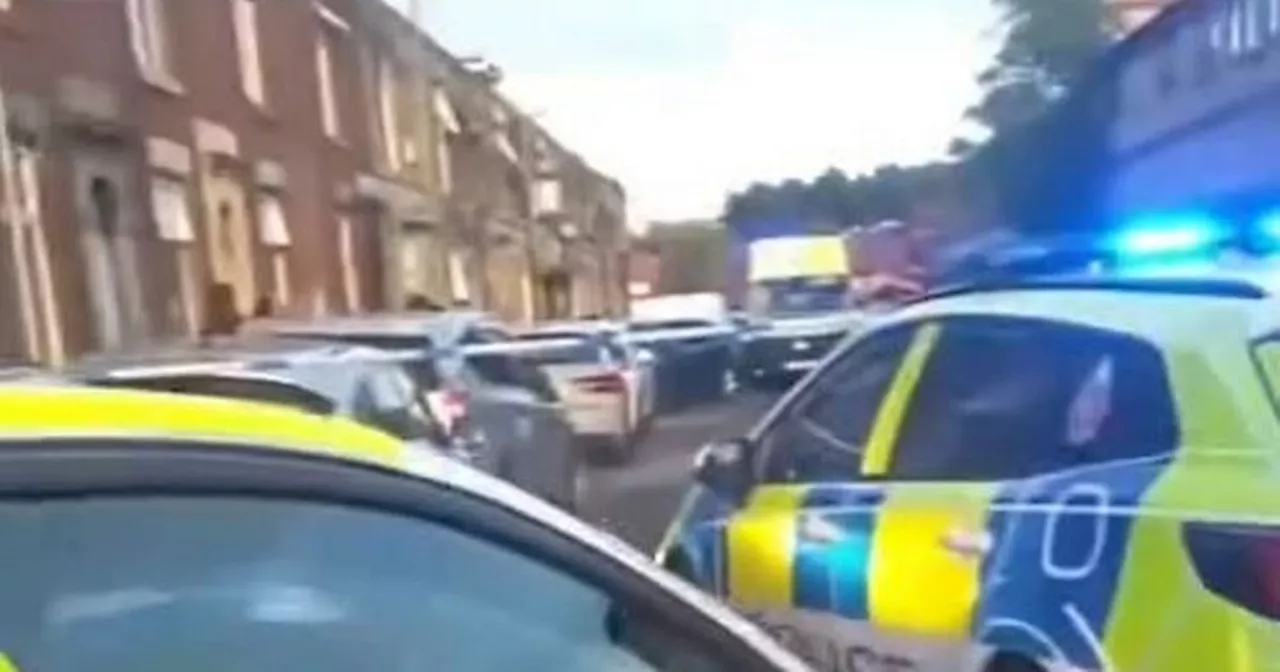 Major police presence as woman rushed to hospital with man arrested