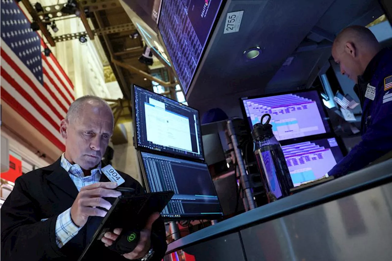 Microsoft sinks, chipmakers climb as AI rally faces divide