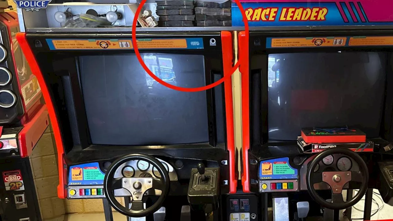 Rebels bikie charged over cash and guns allegedly stashed in Daytona USA arcade game in Perth