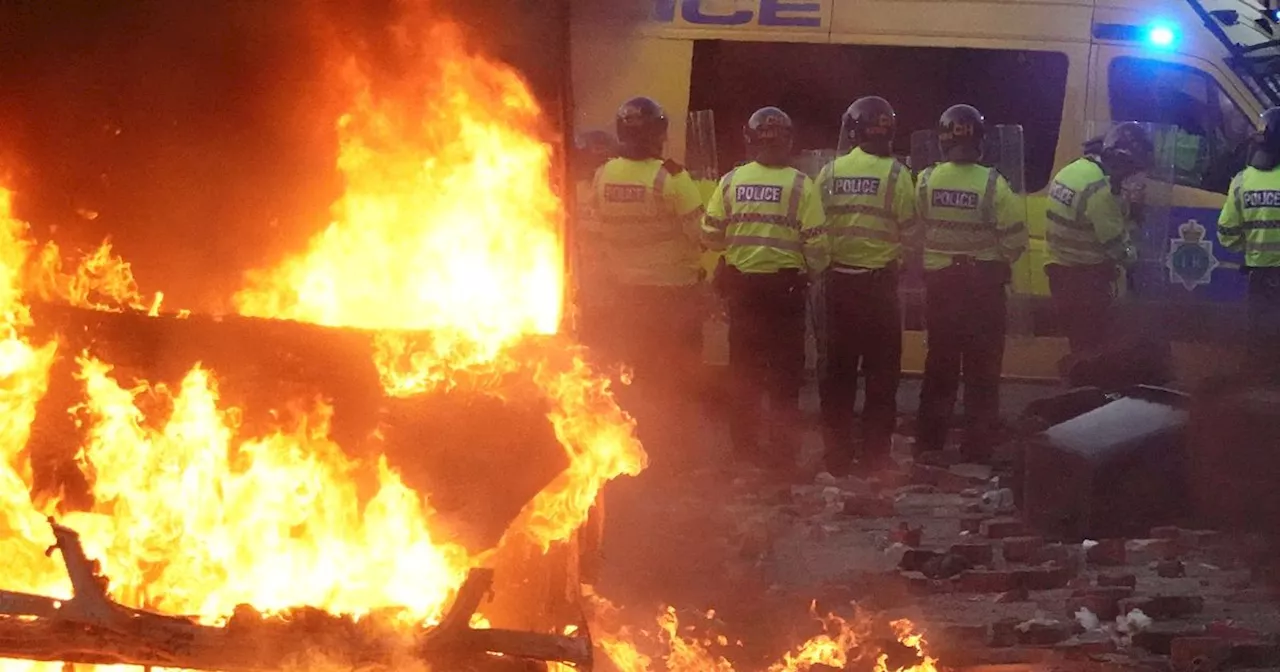 English Defence League rioters clash with Police in Southport after vigil