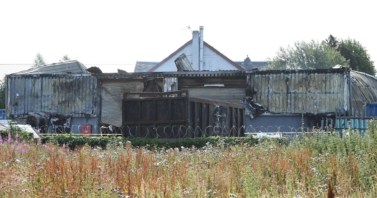 Fire rips through well known carpet store in Wishaw