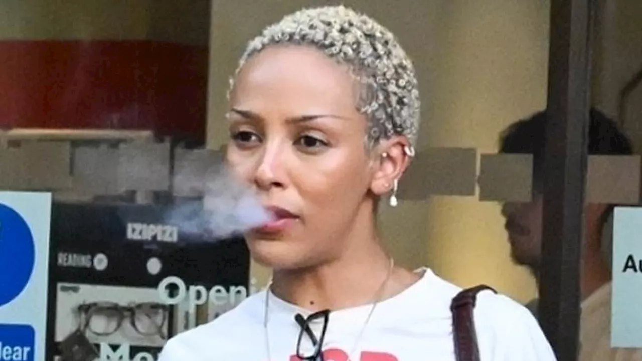 Doja Cat puffs on a cigarette while stopping by bookstore in London... despite proudly declaring she...