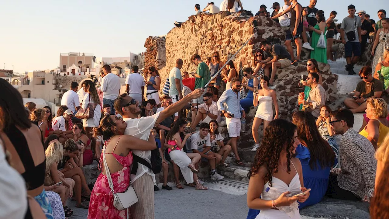 Furious Santorini locals threaten to LEAVE Greek island after officials told them to keep out of...