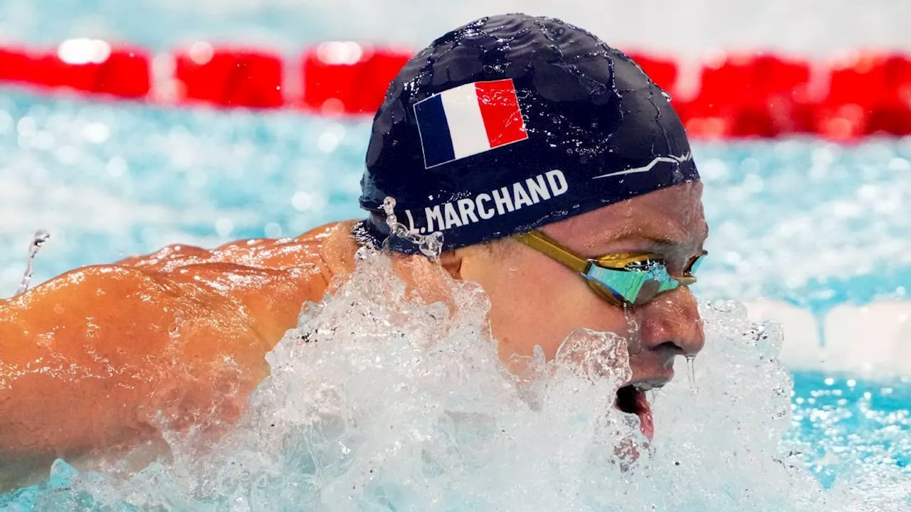 Léon Marchand sets two Olympic records; gold medal haul at 3