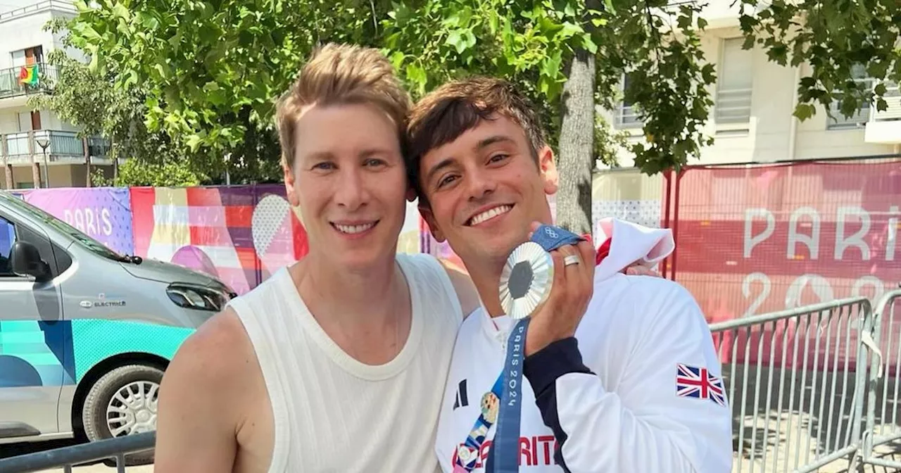 Tom Daley's husband shares rare family snaps as they celebrate Olympic win