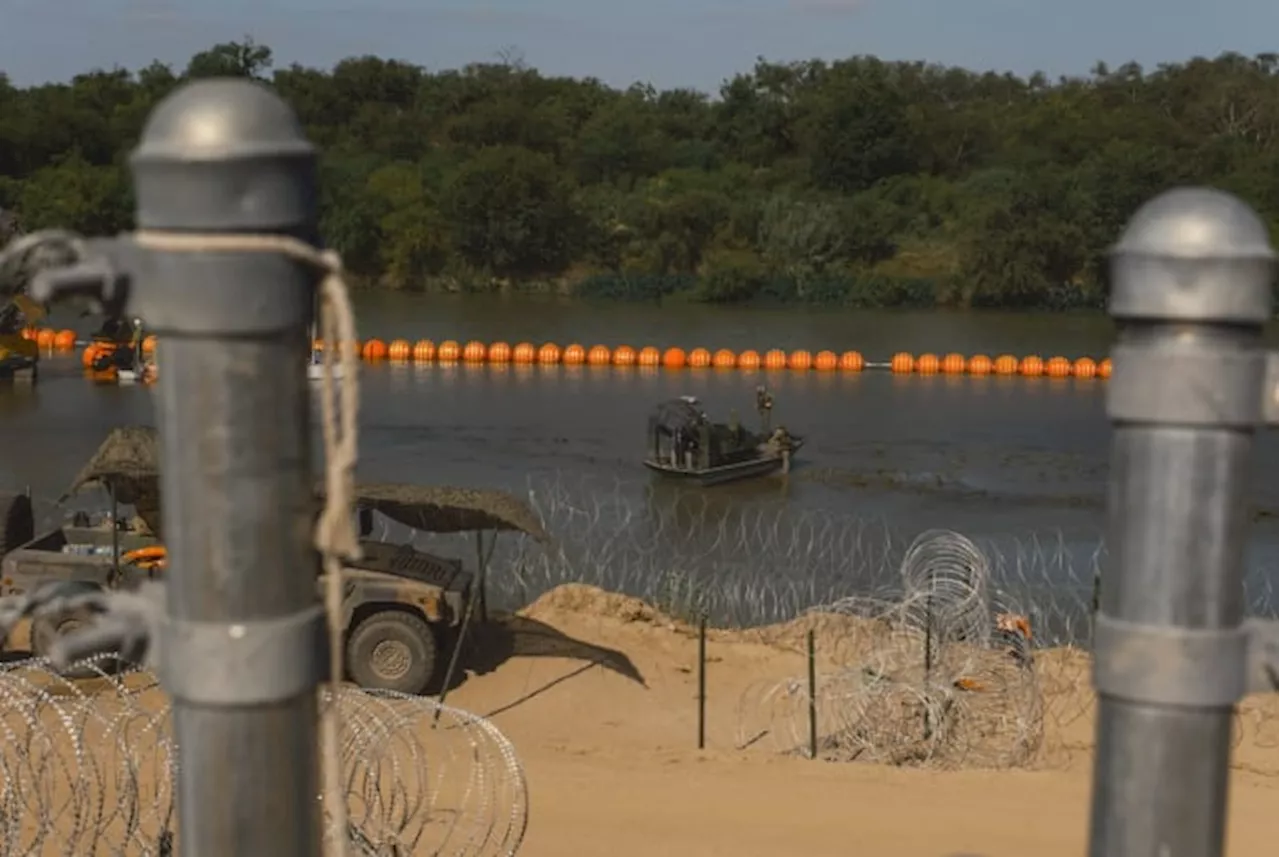 Texas’ floating barrier in the Rio Grande can stay for now, appeals court says