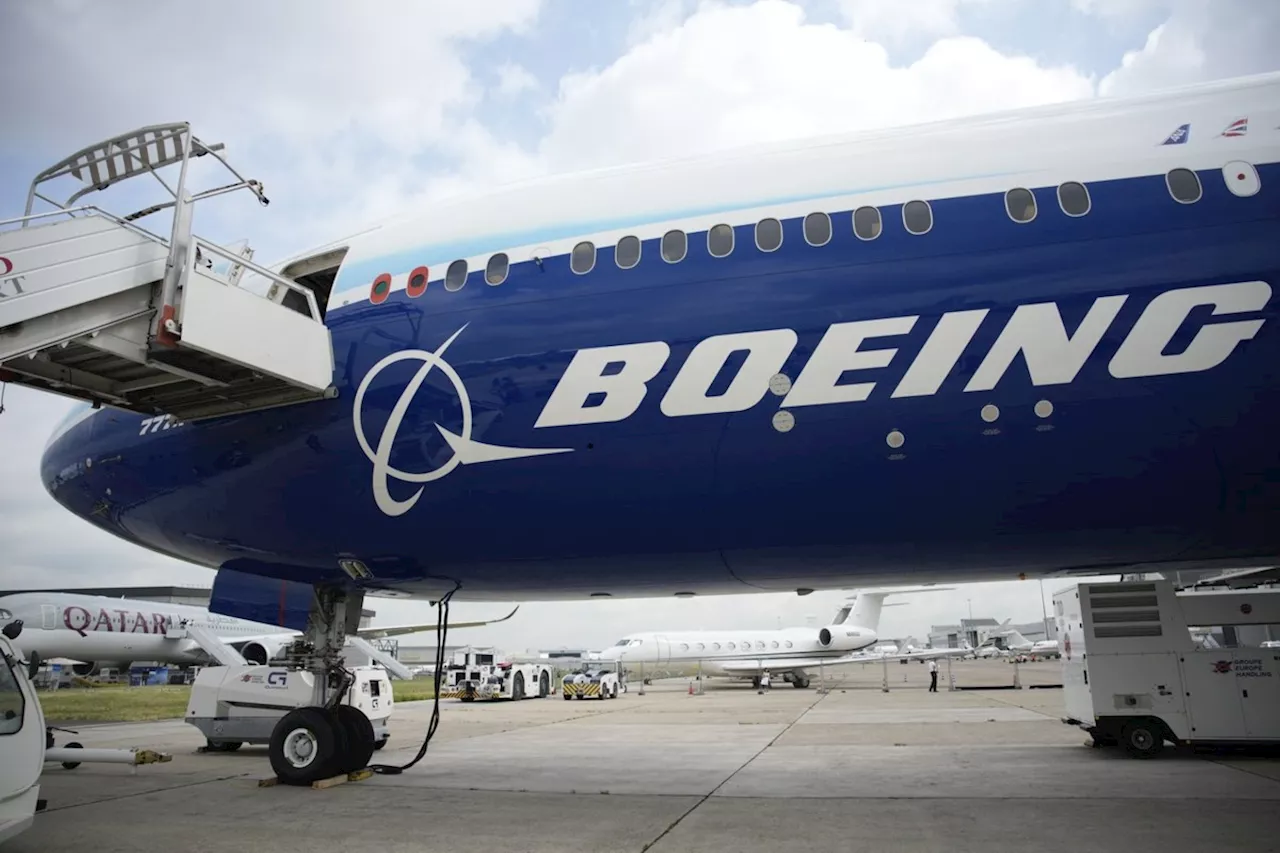 Boeing names new CEO as it posts loss of more than $1.4 billion in second quarter