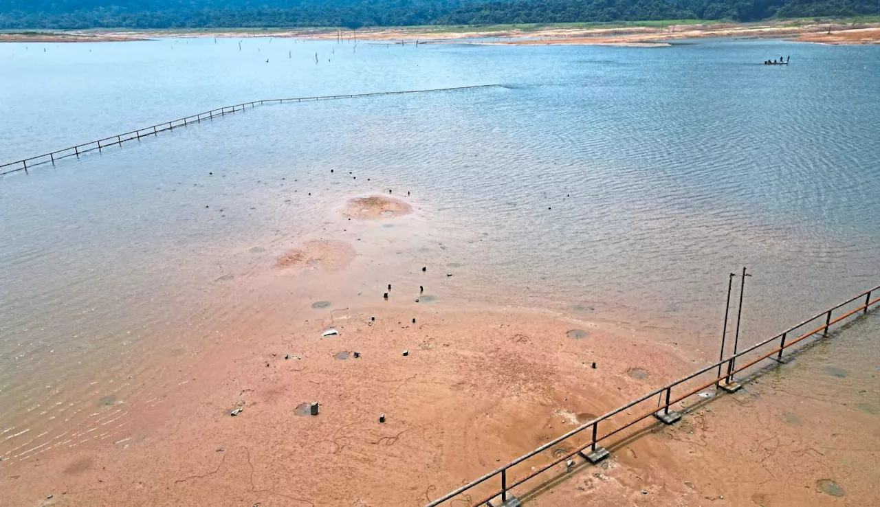 Old graves emerge from Pedu lake