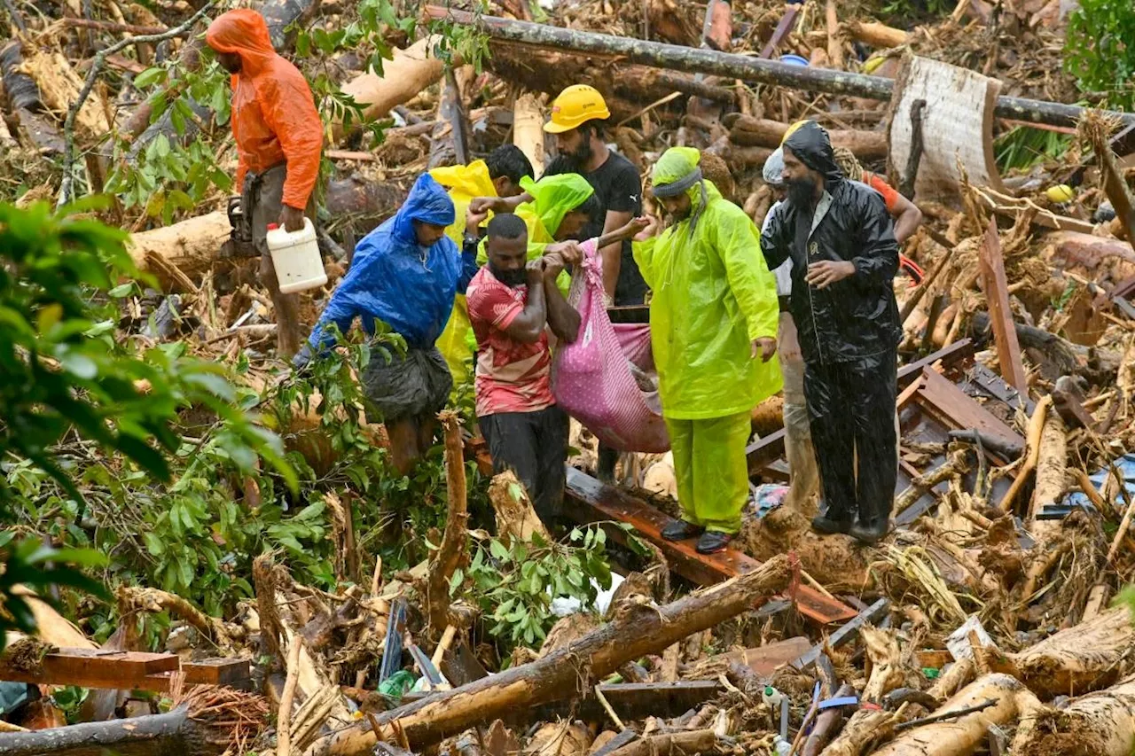 India landslide toll hits 122 as rain hampers rescue work