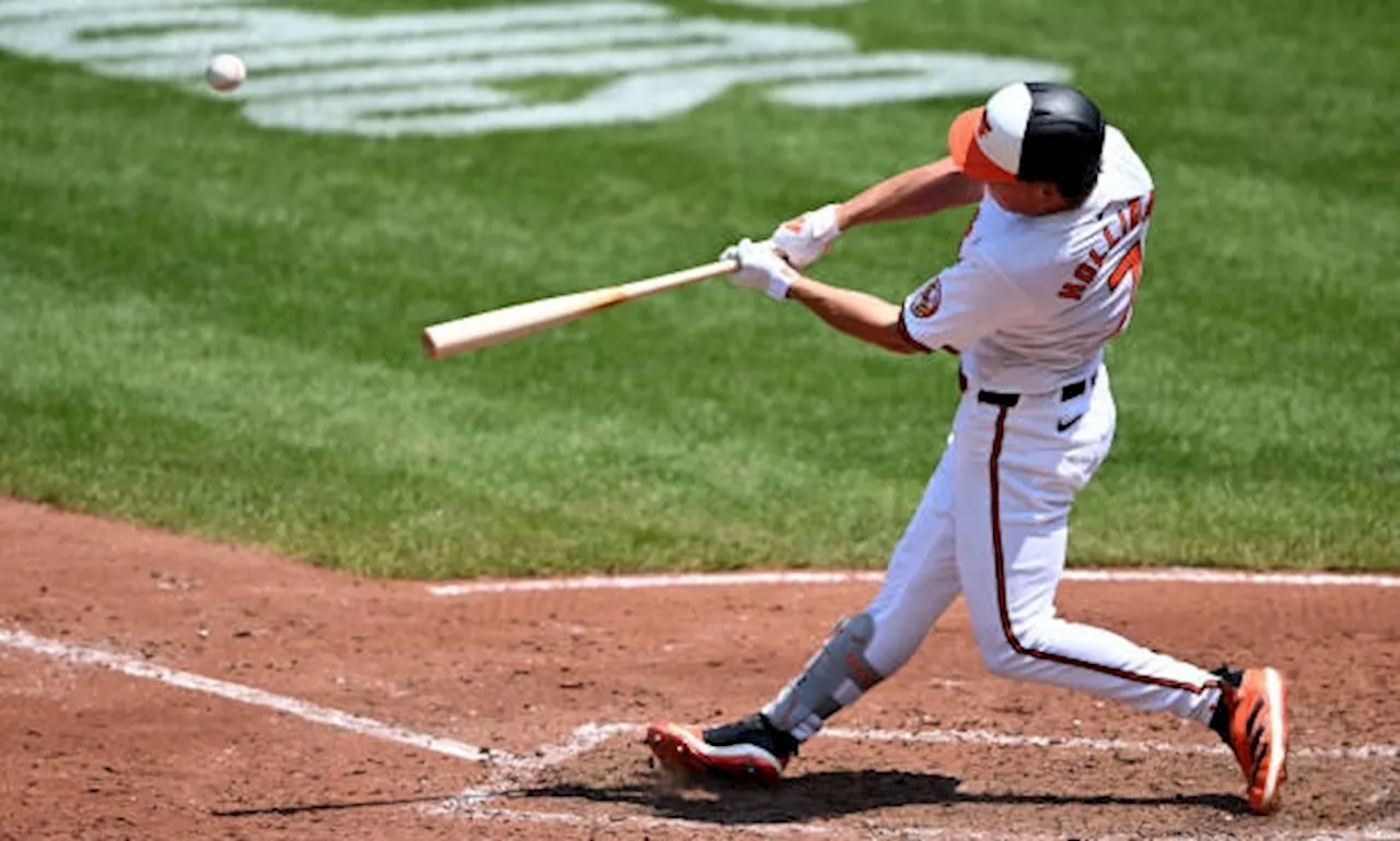 Holliday's grand slam lifts Orioles to victory over Blue Jays