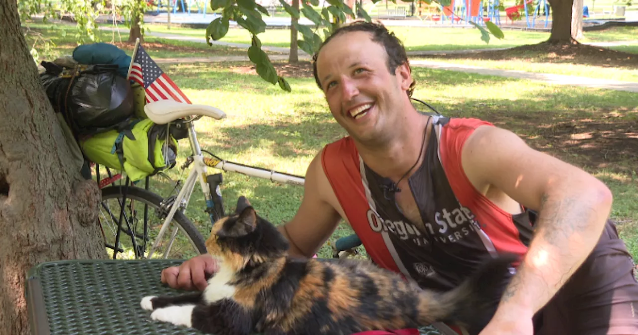 Meet the man cycling across United States with his cat, Marilyn Monroad