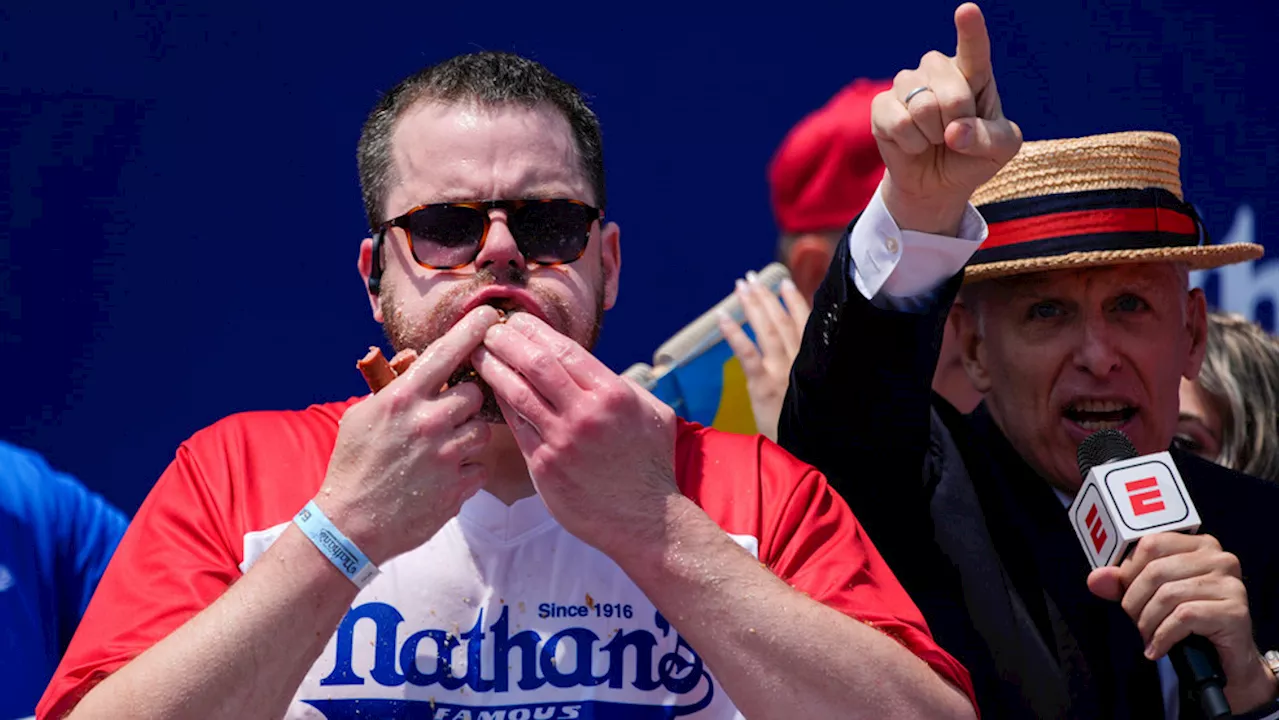 Patrick Bertoletti wins his first mens title at annual Nathan's hot dog eating contest