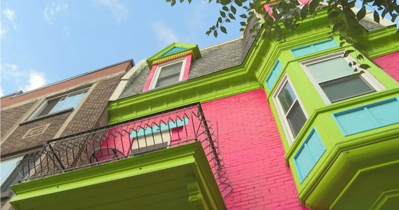 Montreal officials see red after century-old home turned into colourful billboard