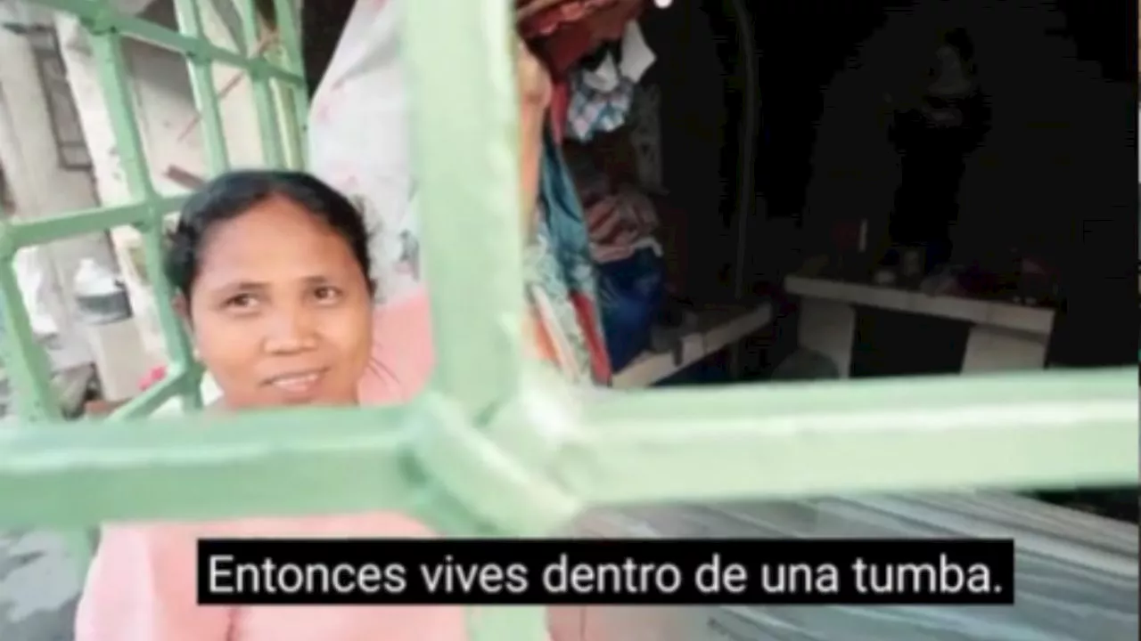 VIDEO: las inquietantes imágenes de cómo es vivir dentro de las tumbas de un cementerio