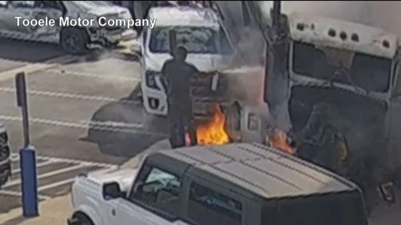 New surveillance video shows semi crash into Tooele car dealership, immediate aftermath