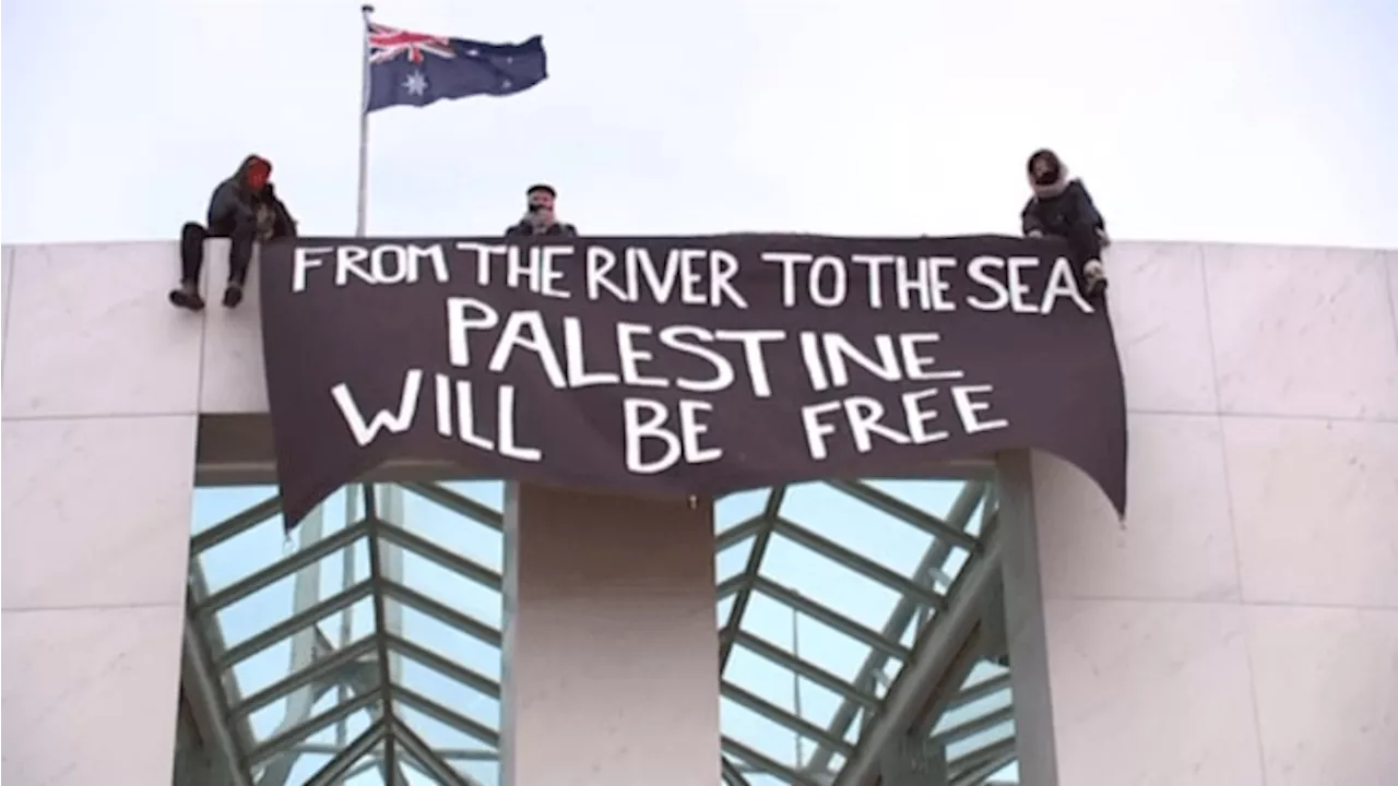 Pro-Palestinian protesters climb on top of Canberra’s Parliament House