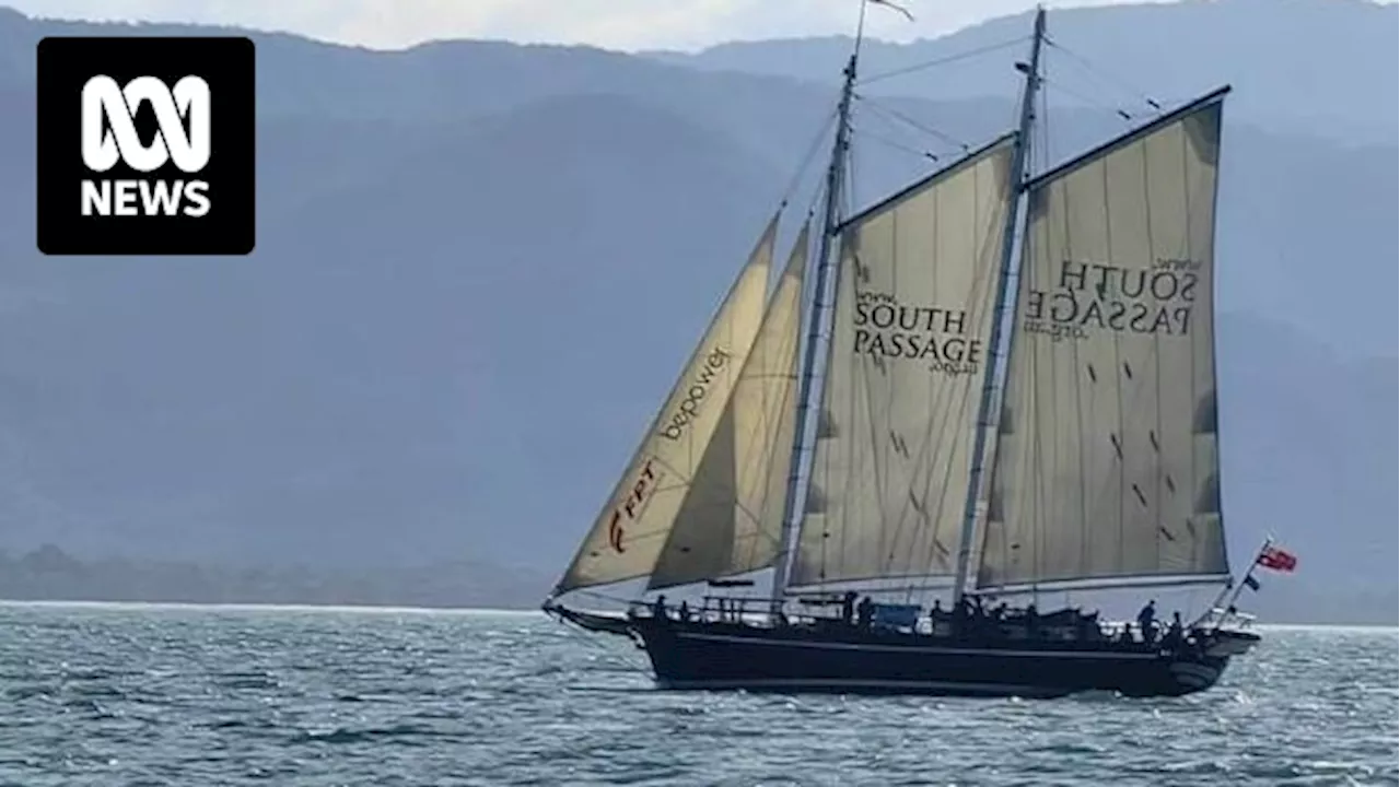 Teenage tall ship sailors rescue kayakers from crocodile-prone North Queensland channel