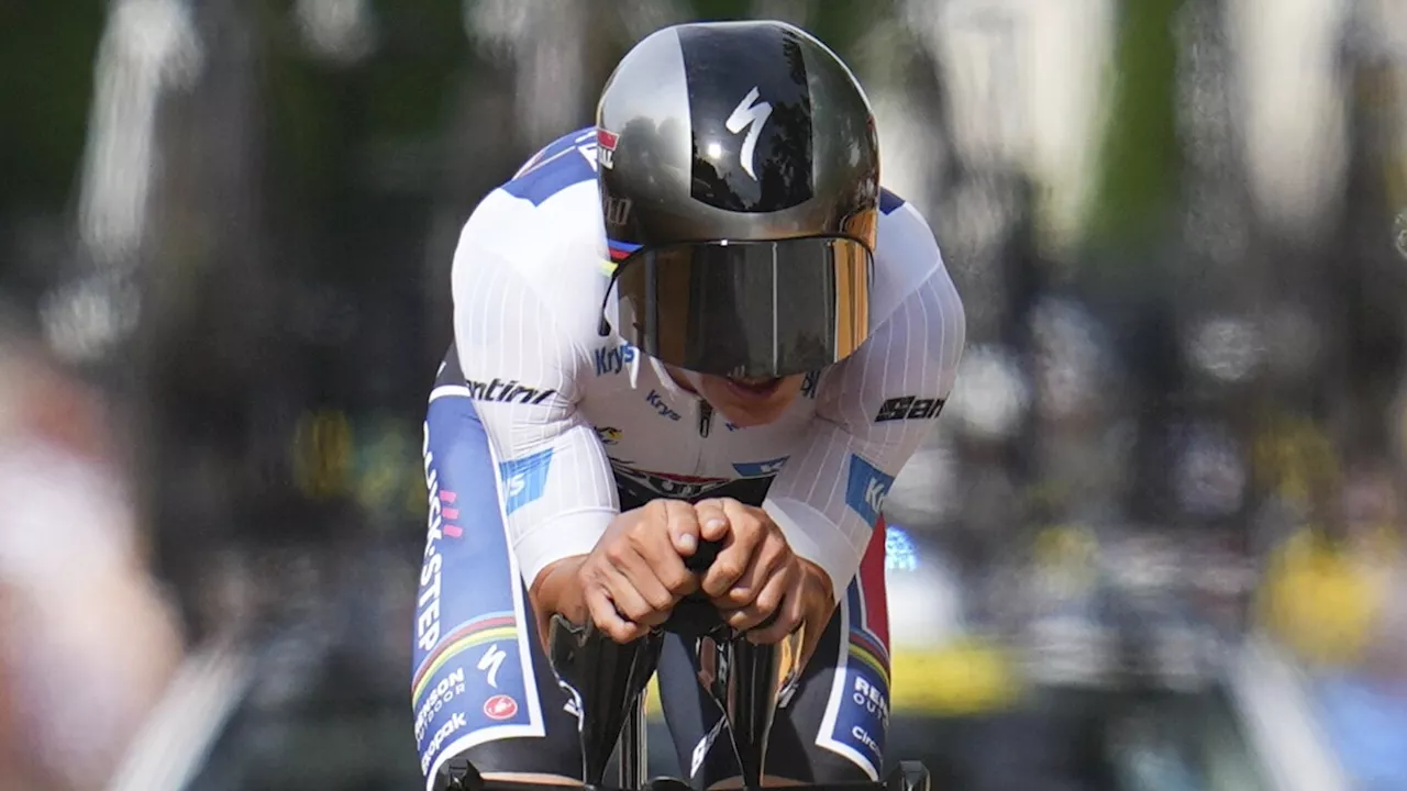 Evenepoel wins Tour de France time trial with vintage performance in Burgundy vineyards