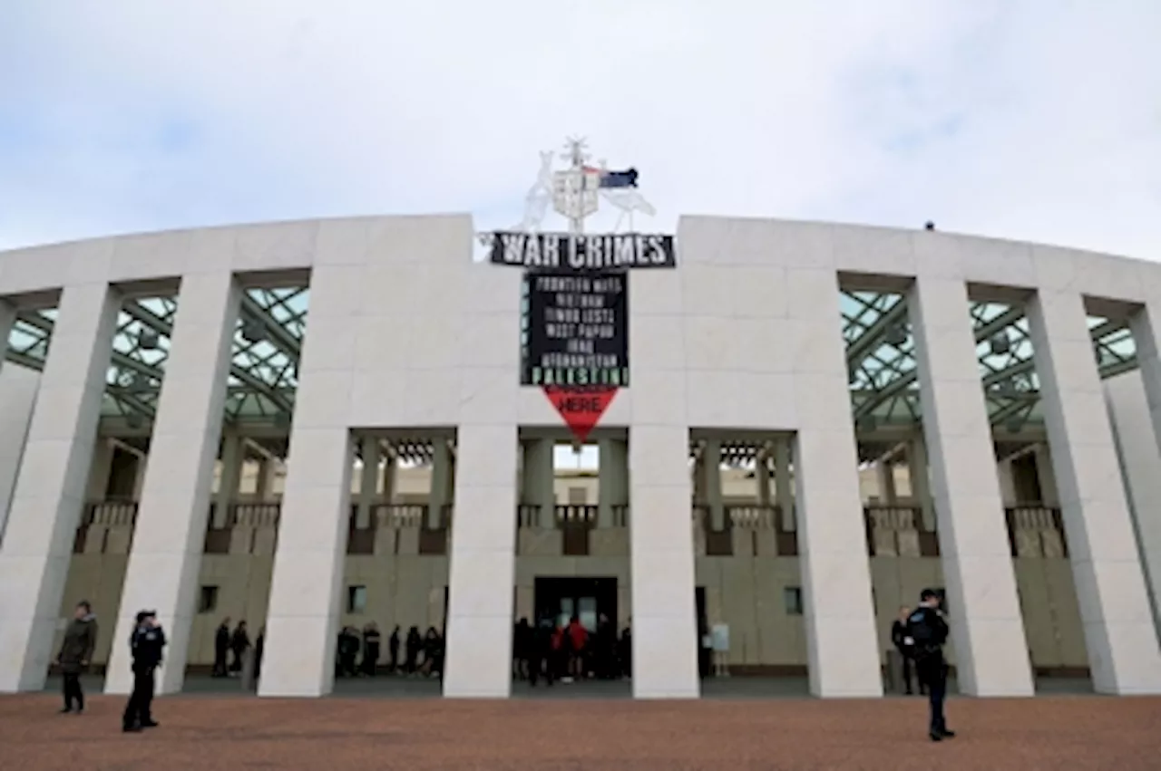 Four pro-Palestine protesters arrested after climbing Australian parliament roof