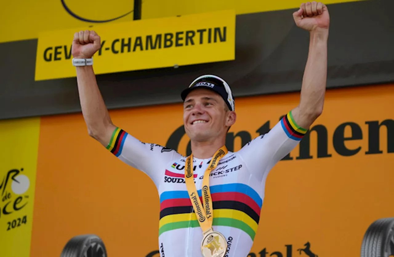 Pogacar keeps Tour lead as Evenepoel wins 7th stage time-trial