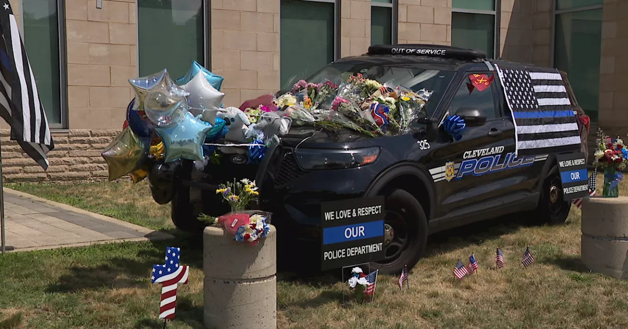 Memorial for fallen Cleveland officer Jamieson Ritter grows outside of headquarters