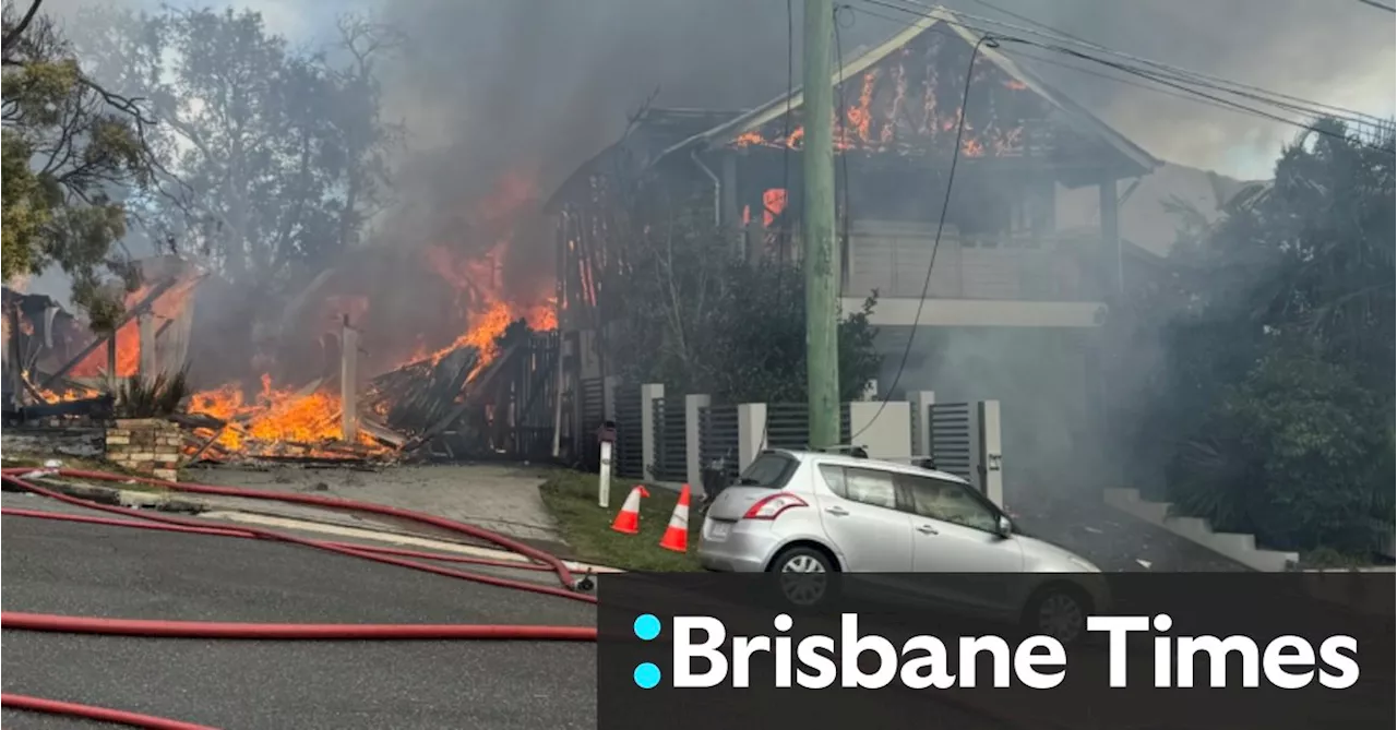 Fire rips through two Brisbane homes, firefighters battling to save two more