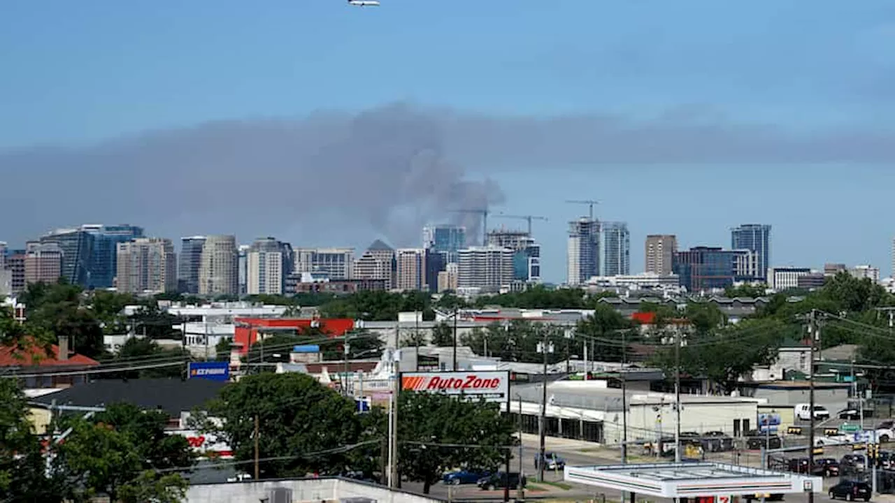 Black smoke seen in West Dallas as crews put out fire