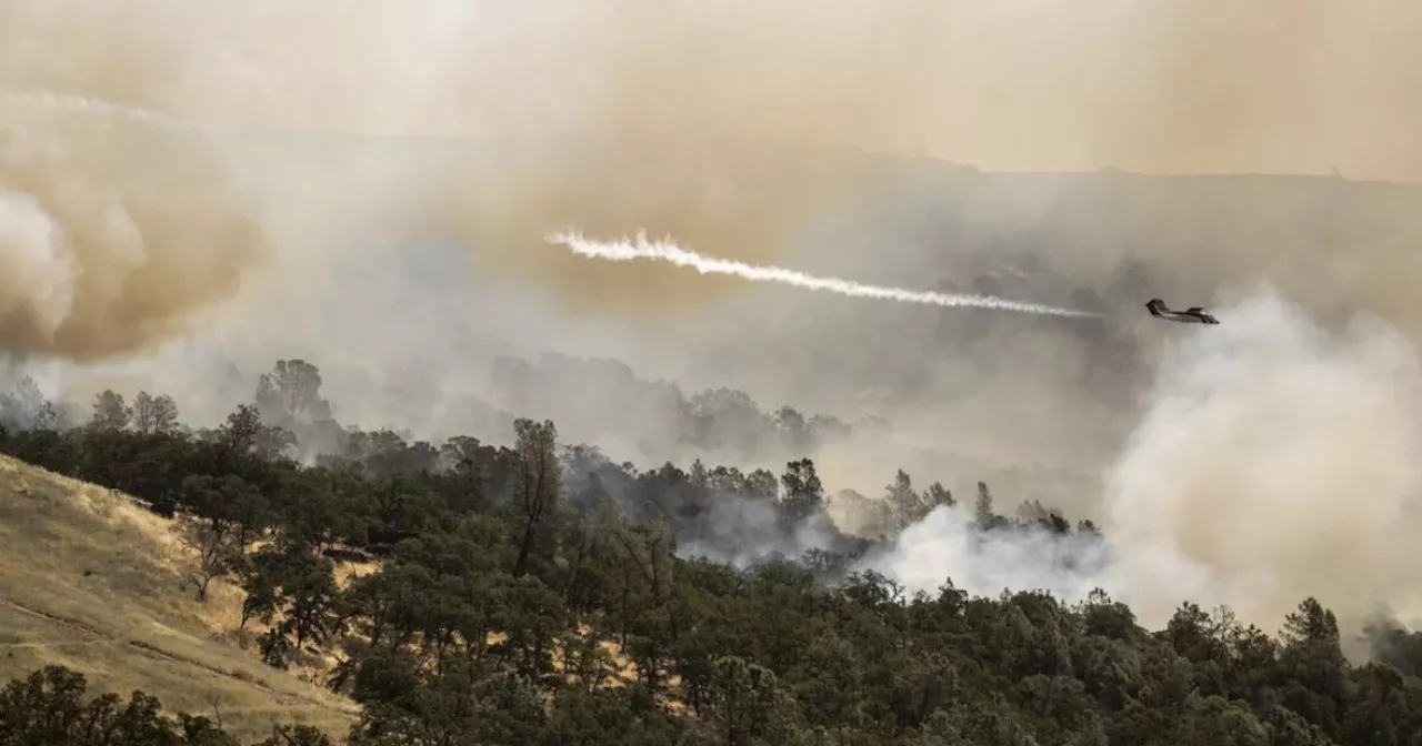 Firefighters make progress against Northern California fire, but heat risks grow in the West